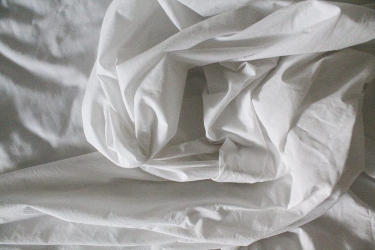 How To Remove Lint From Bed Sheets: Click Away the Fuzz!